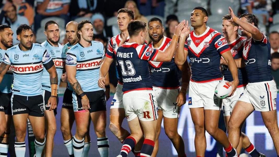 Young gun half shines for Roosters as Sharks routed in glaring premiership fail