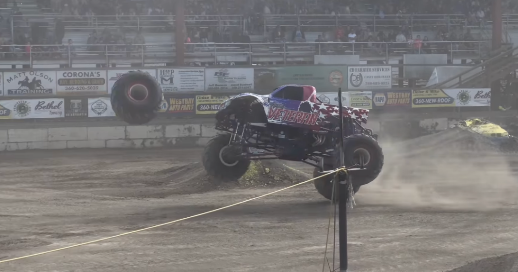 Video shows monster truck wheel fly off mid-performance, damaging multiple cars